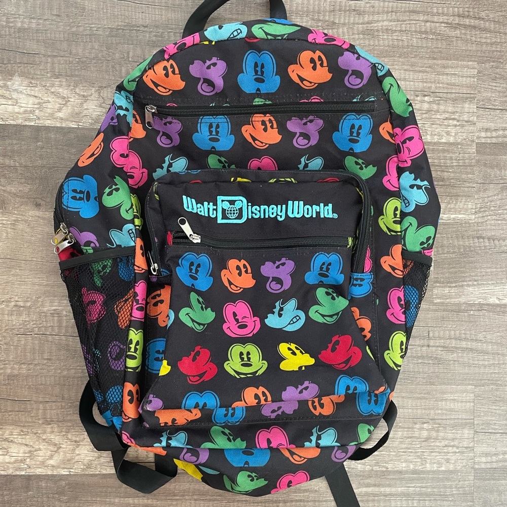 Disney Parks backpack, multi colored Mickey heads and faces